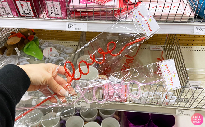 a Hand Holding Valentines Day Novelty Straws