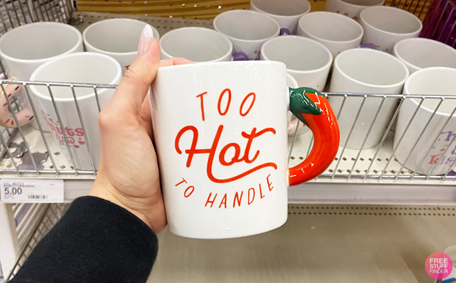 a Hand Holding Valentines Day Too Hot To Handle Coffee Mug
