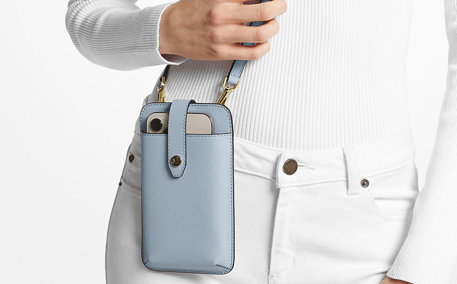 a Woman Wearing Michael Kors Leather Smartphone Crossbody Bag