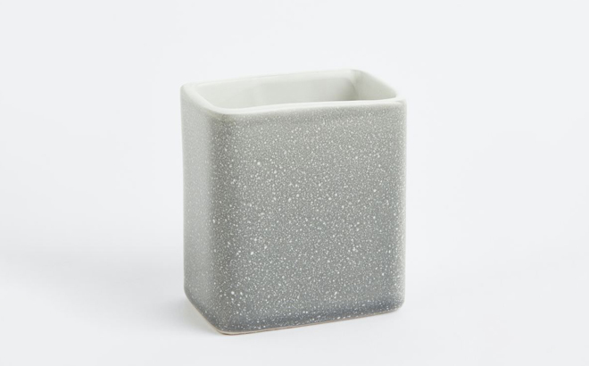 an Image of an HM Stoneware Toothbrush Mug an Image of an HM Stoneware Toothbrush Mug