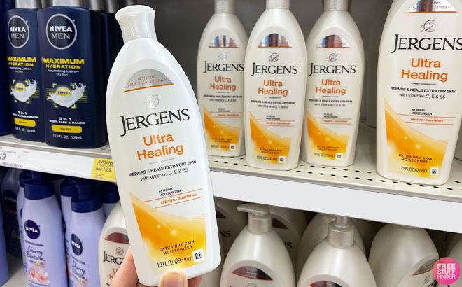 A Hand Holding Jergens Ultra Healing Hand and Body Lotion