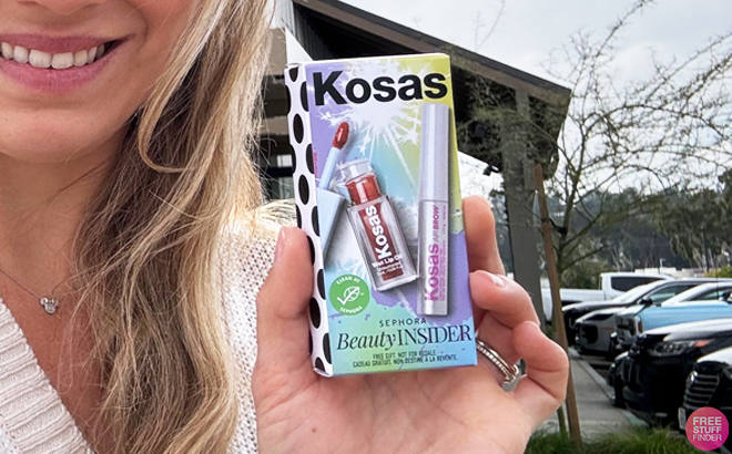 A Person Holding a Box of Kosas Lip Brow Birthday Set