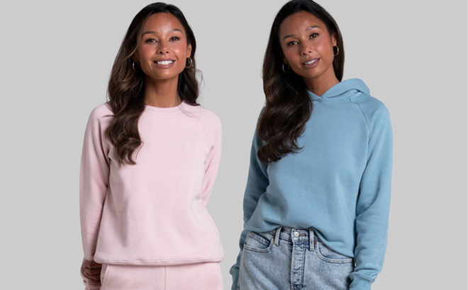 A Woman Wearing Fruit of the Loom Womens Fleece Sweatshirt on the Left and Hoodie on the Right A Woman Wearing Fruit of the Loom Womens Fleece Sweatshirt on the Left and Hoodie on the Right