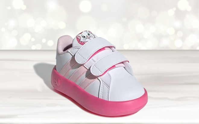 Adidas x Disney Marie Kids Grand Court Tennis Shoe on the Table