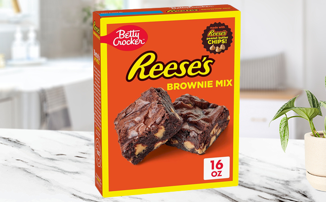 Betty Crocker REESES Peanut Butter Premium Brownie Mix Box on a Kitchen Counter
