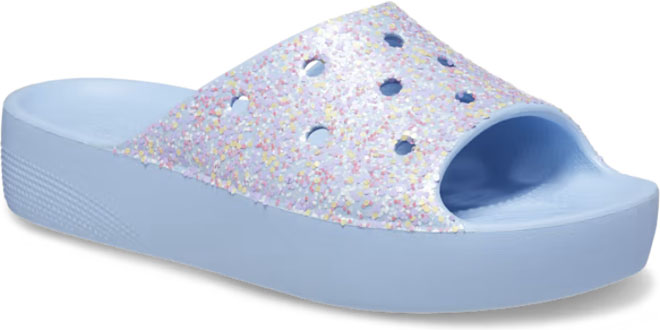Crocs Classic Platform Glitter Slides on a Gray Background