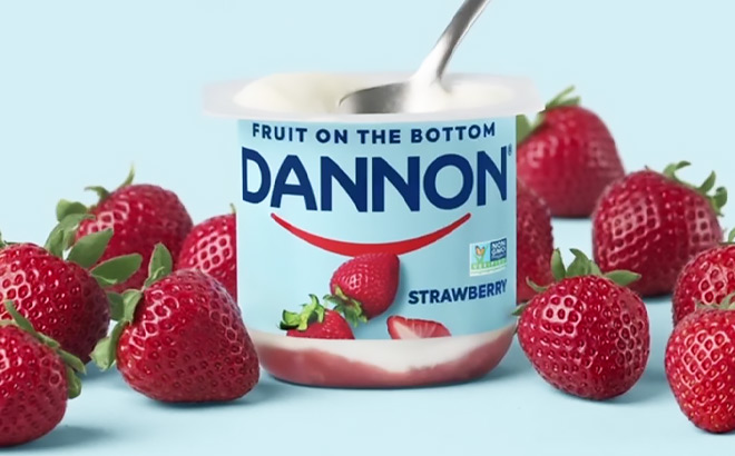 Dannon Strawberry Yogurt next to Strawberries