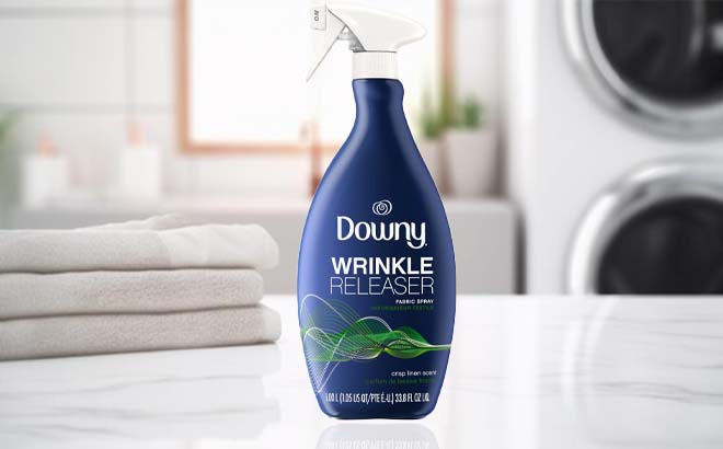 Downy Wrinkle Releaser and Refresher Fabric Spray in Crisp Linen Scent on a Bathroom Counter