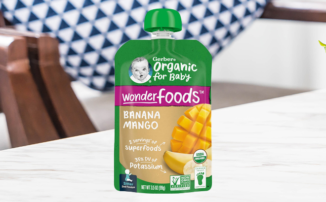 Gerber Organic Baby Food Pouch in Banana Mango Flavor on a Table