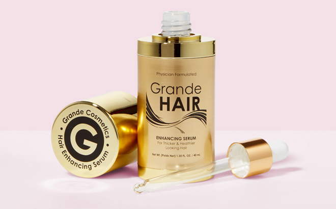 Grande Hair Enhancement Serum with a Pink Background