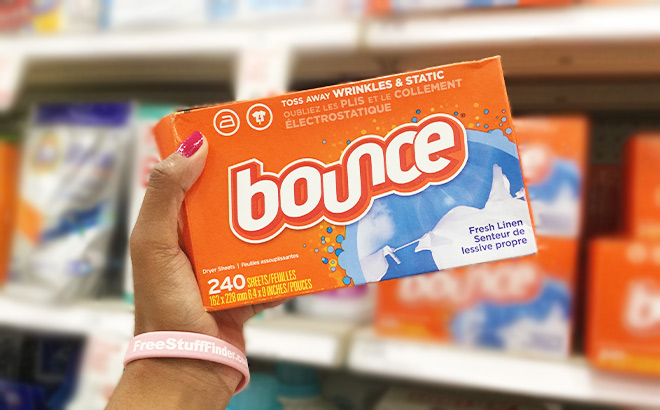 Hand Holding Bounce Dryer Sheets Laundry Fabric Softener