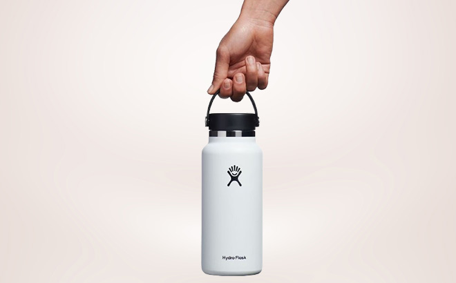 Hand Holding Hydro Flask Stainless Steel Wide Mouth Bottle
