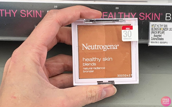 Hand Holding Neutrogena Bronzer Hand Holding Neutrogena Bronzer