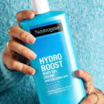 Hand Holding Neutrogena Hydro Boost Body Moisturizing Gel Cream with Hyaluronic Acid