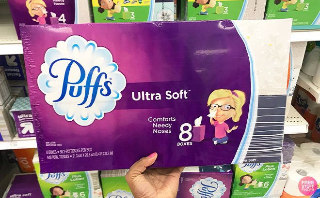 Hand Holding Pussf Ultra Soft Non Lotion Tissues at a Store