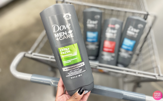 Hand Holding a Bottle of Dove Men Care Body Face Wash Hand Holding a Bottle of Dove Men Care Body Face Wash