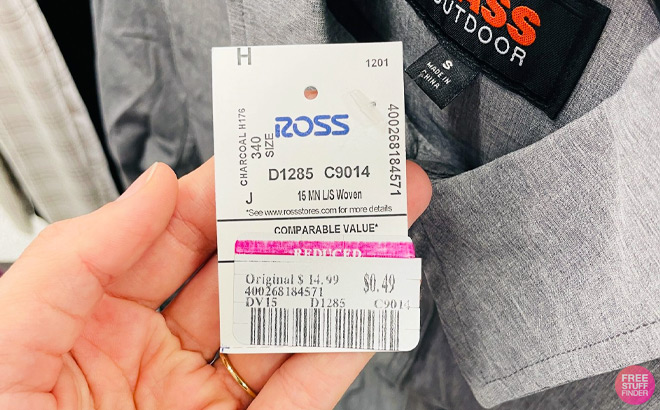 Hand Holding a Ross Reduced 49 Cent Sale Tag