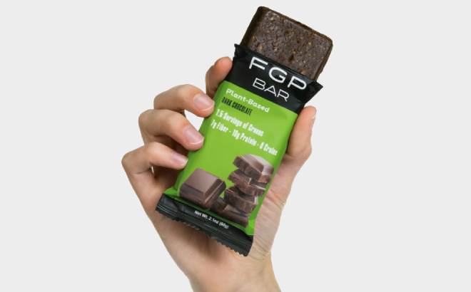 Hand Holding an FGP Protein Bar