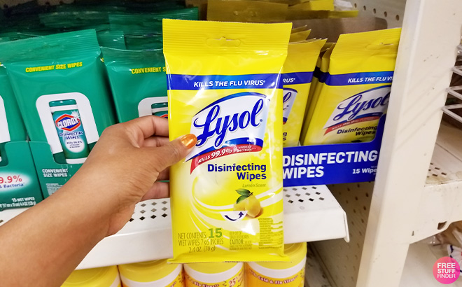 Hand holding Lysol Disinfecting Wipes