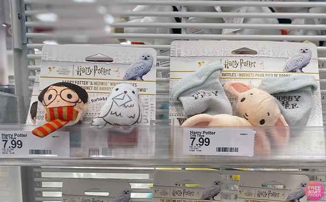 Harry Potter and Hedwig Wrist Rattle and Harry Potter Dobby Foot Rattle in shelf