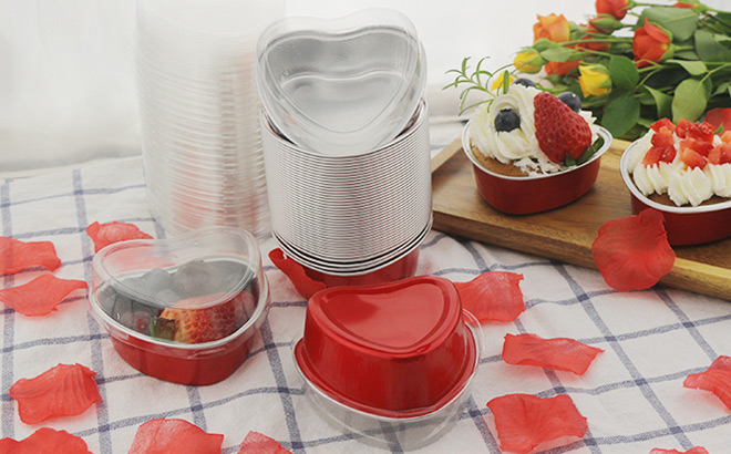 Heart Shaped Cake Pans Lids and Petals on a Table