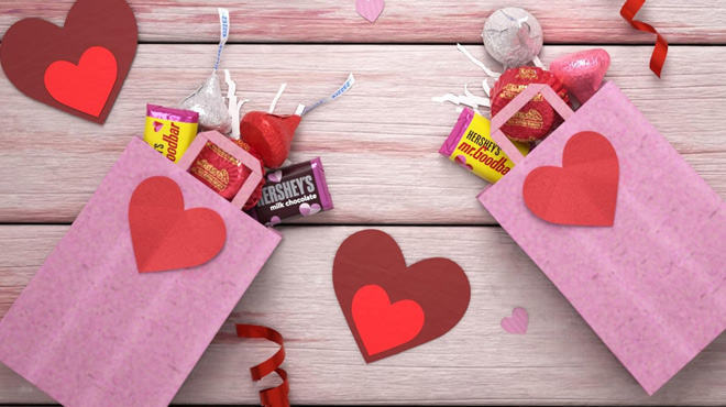 Hersheys and Reeses Valentines Day Candy in Small Pink Bags on a Table