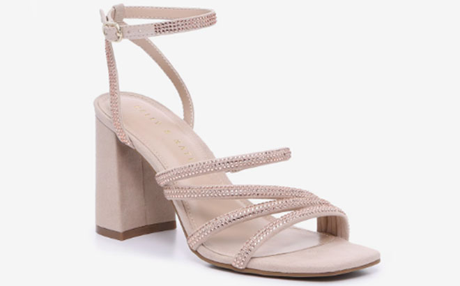 Kelly Katie Cadene Sandals on a Gray Background