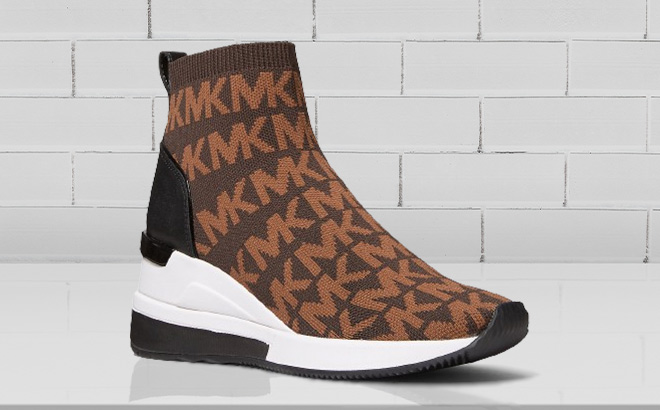 Michael Kors Skyler Logo Stretch Knit Sock Sneaker in Chocolate Combo Color on the Table
