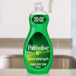 Palmolive Ultra Strength Liquid Dish Soap Beside a Kitchen Sink