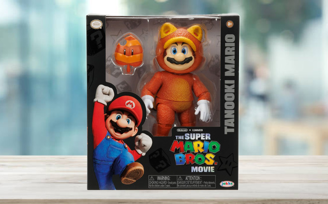 Super Mario Bros Movie Tanooki Mario Figure on Desk Super Mario Bros Movie Tanooki Mario Figure on Desk