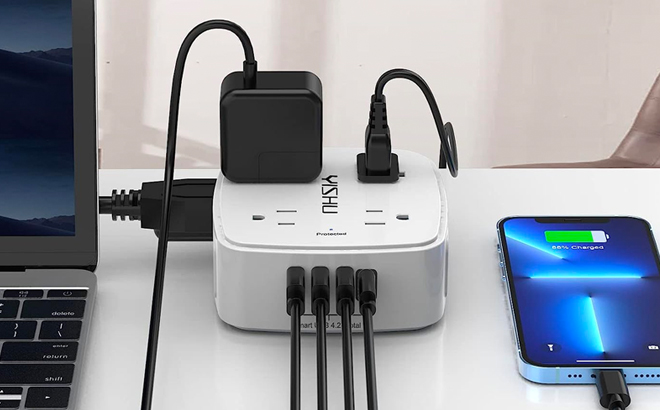 Surge Protector Power Strip on a Desk with Devices