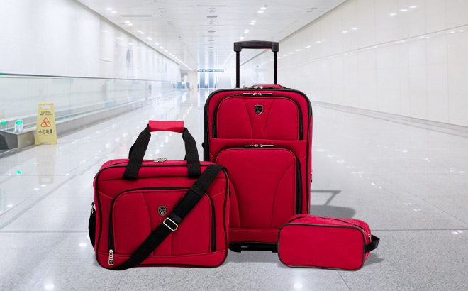 Travelers Club 3 Piece Luggage Set on Airport Floor Travelers Club 3 Piece Luggage Set on Airport Floor