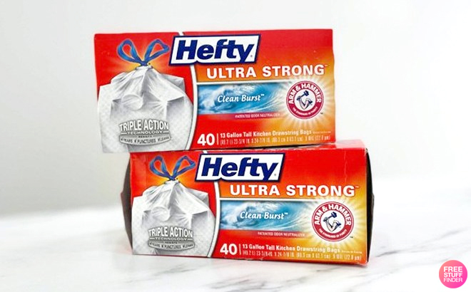 Two Boxes of Hefty 40 Count Ultra Strong Clean Burst Trash Bags on a Marble Kitchentop