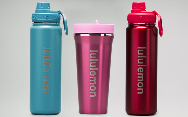Two Lululemon Water Bottles and one Lulemon Tumbler