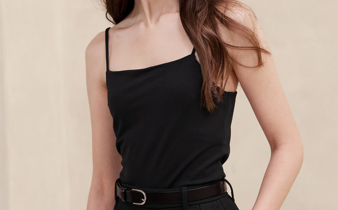 Woman is Wearing Banana Republic Soft Stretch Camisole in Black Color