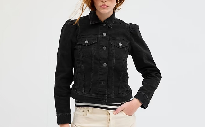 a Person Wearing a GAP Factory Womens Denim Jacket Black Color