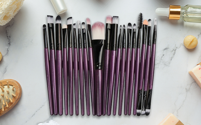 20 Piece Makeup Brush Set in the Color Purple on a Makeup Table