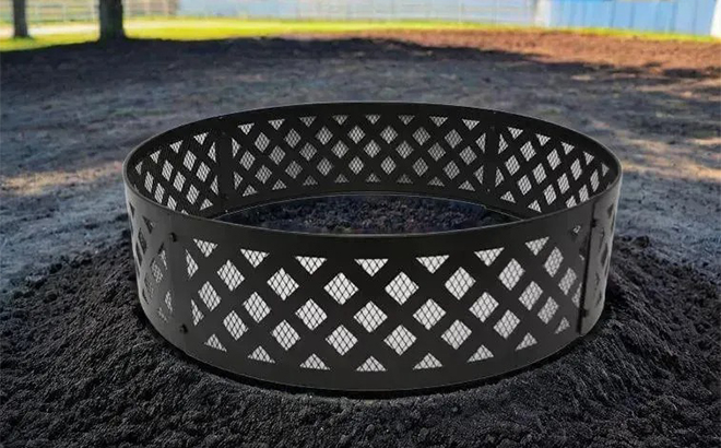 36 Inch Round Metal and Steel Fire Ring Black by Mainstays Placed on Dirt in a Backyard Garden