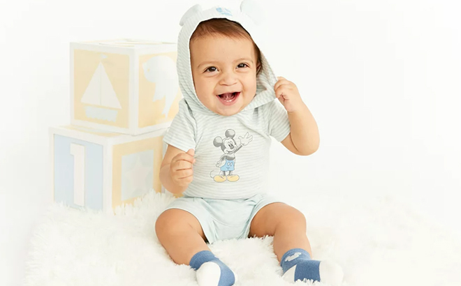 A Baby Wearing Disney Mickey Mouse Newborn Set