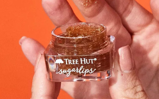 A Hand Holding Tree Hut Brown Sugar Sugarlips Lip Scrub