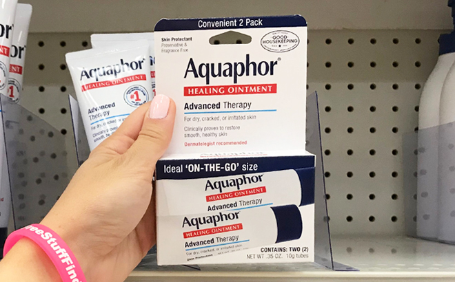 A Hand Holding an Aquaphor 2 Count Healing Ointment Skin Protectant