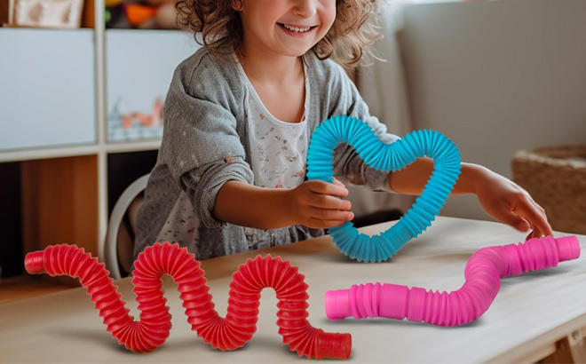 A Kid Holding Bunmo Easter Basket Stuffers Pop Tubes Large