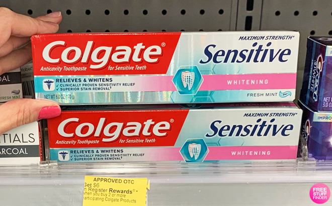 A Person Holding Colgate Sensitive Toothpaste