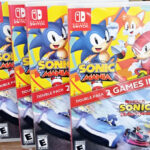 A Person Holding Nintendo Switch Sonic Mania Team Sonic Racing Double Pack Game