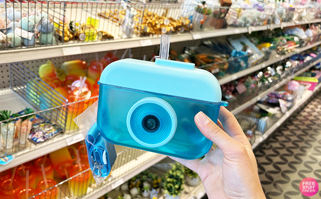 A Person Holding a Blue Camera Tumbler at Target Dollar Spot