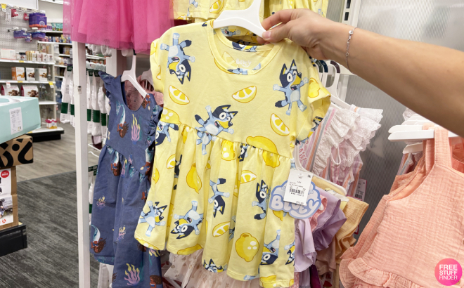 A Person Holding a Bluey Toddler Girls T Shirt Dress