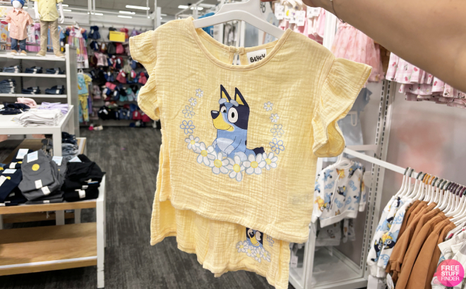 A Person Holding a Bluey Toddler Girls Top and Bottom Set