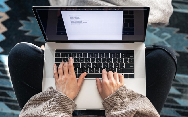 A Person Using a Laptop