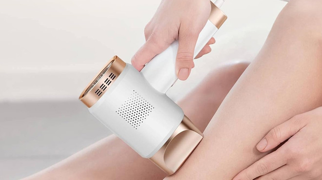 A Person Using the Aopvui At Home IPL Hair Removal for Women and Men on the Leg