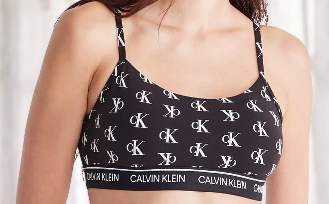 A Person Wearing Calvin Klein Logo Bralette